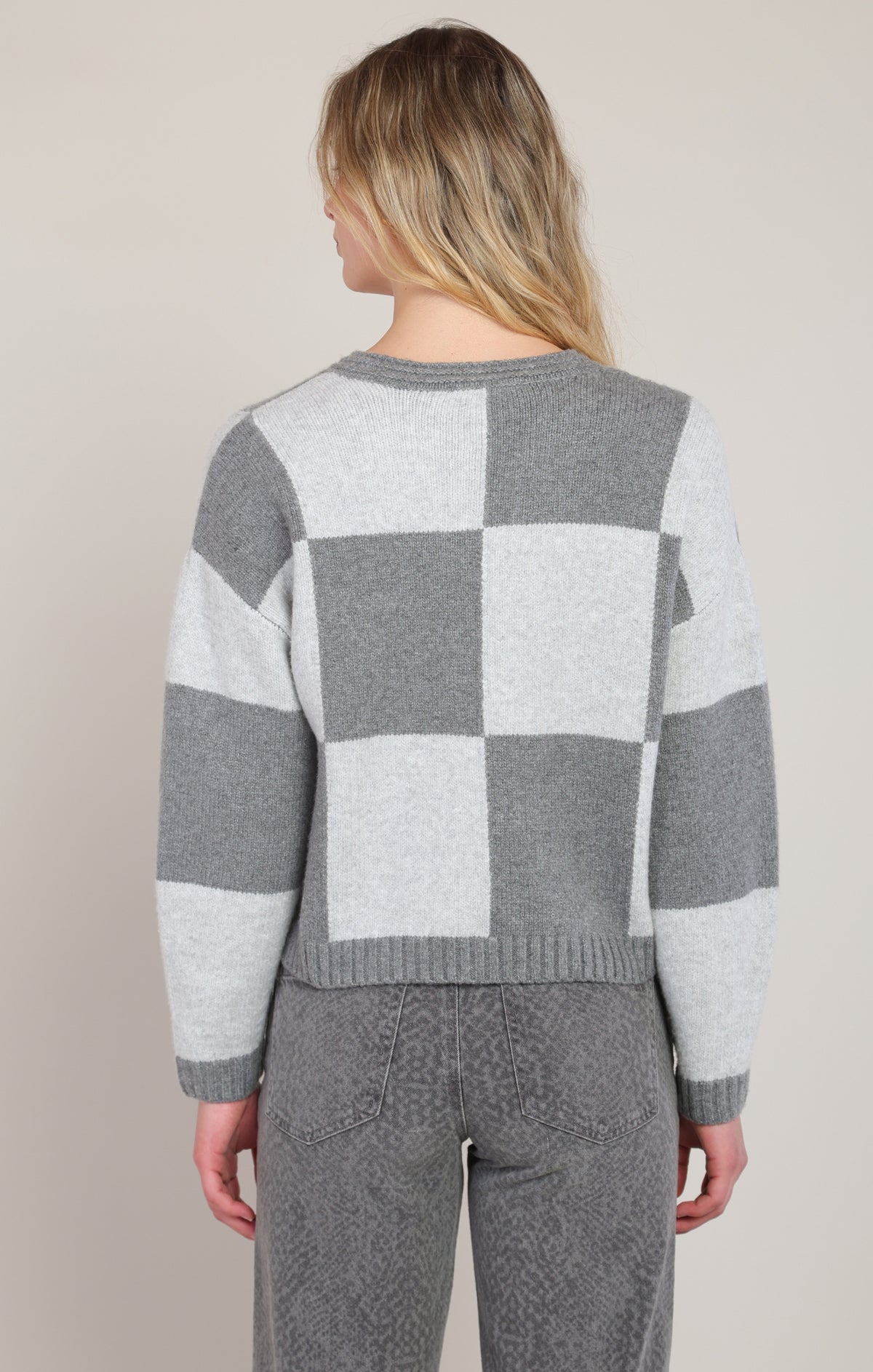 The Checkmate V-Neck Sweater ♟️